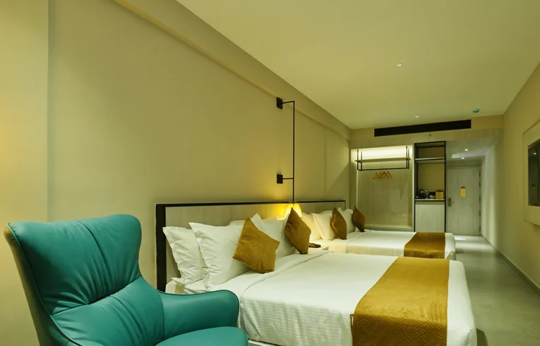 Plush mattresses and premium linens in Opus Family Room - Best Place To Stay In Wayanad with kids